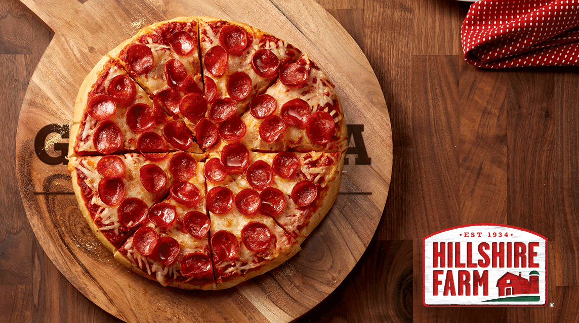 pizza toppings on a round pizza.