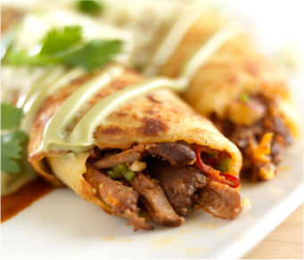 Pulled pork tacos with green cilantro salsa