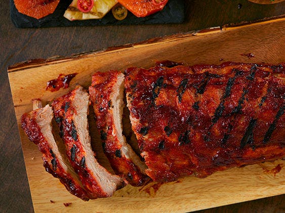 baby back ribs on a cutting board