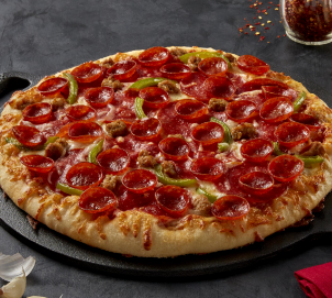 Artisanal Meaty Trio Pizza dish.