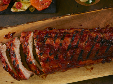 Spareribs on a wooden board