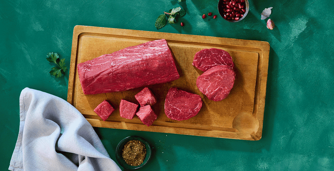 Steaks on a cutting board 